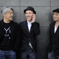 Yellow Magic Orchestra members (from left) Ryuichi Sakamoto, Yukihiro Takahashi and Haruomi Hosono first recorded together on Hosono’s 1978 “Paraiso” album. | REUTERS