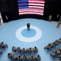 U.S. President Joe Biden speaks to American soldiers from the 82nd Airborne Division near Rzeszow, Poland, in March. | REUTERS