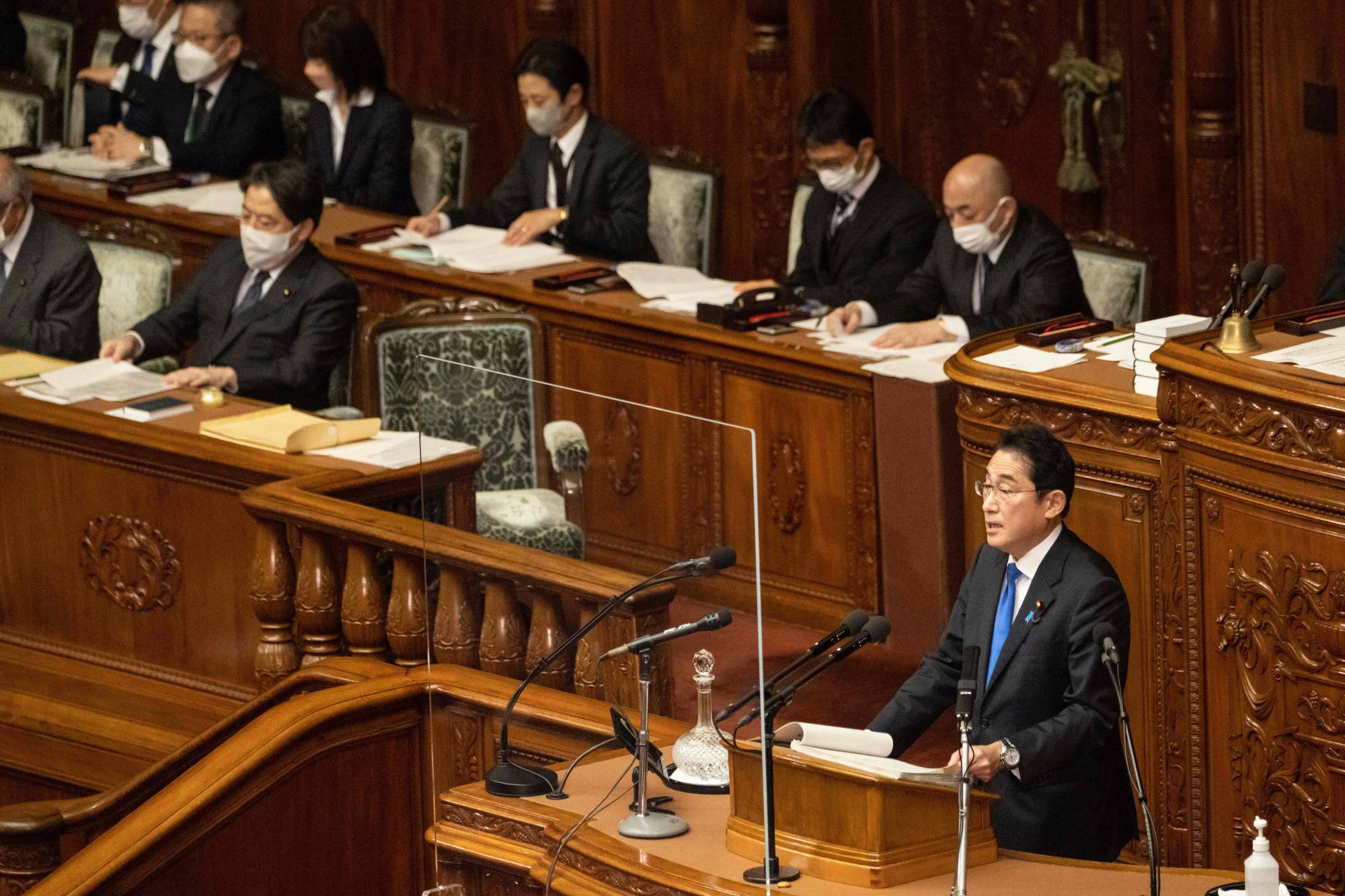 Prime Minister Fumio Kishida delivers a policy speech at the start of an ordinary session of the parliament on Monday. | AFP-JIJI