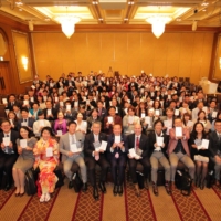 Hara (front row, eighth from left) poses with attendees at a similar event at the Ritz-Carlton, Tokyo in March 2017. | SPIRAL UP CO.