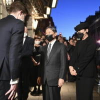 Emperor Naruhito and Empress Masako arrive at a hotel in London on Sept. 17, two days ahead of the funeral of Queen Elizabeth II. | KYODO