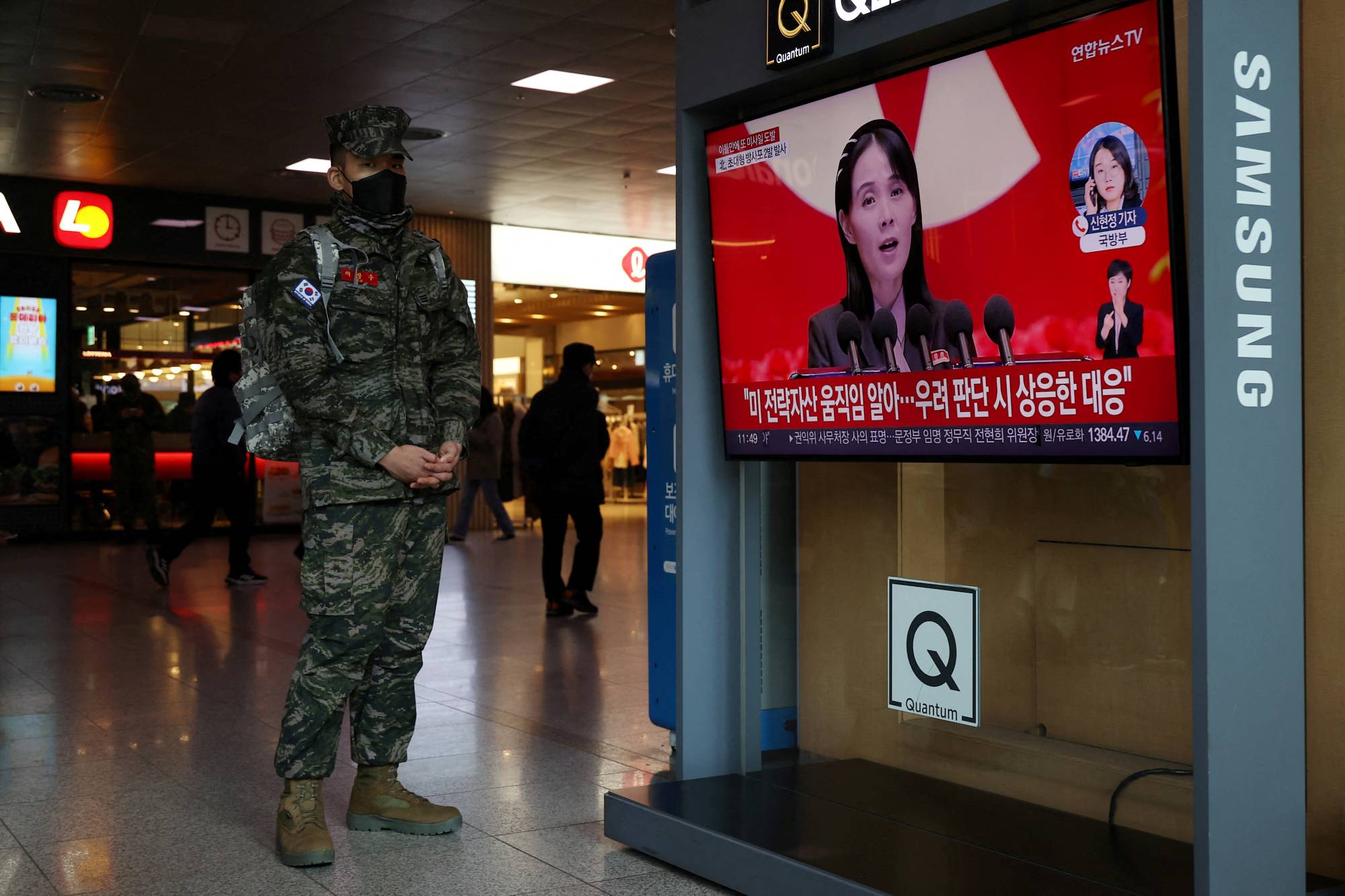 A South Korean marine watches a TV broadcasting a news report on a recent North Korean missile launch, in Seoul on Monday. | REUTERS