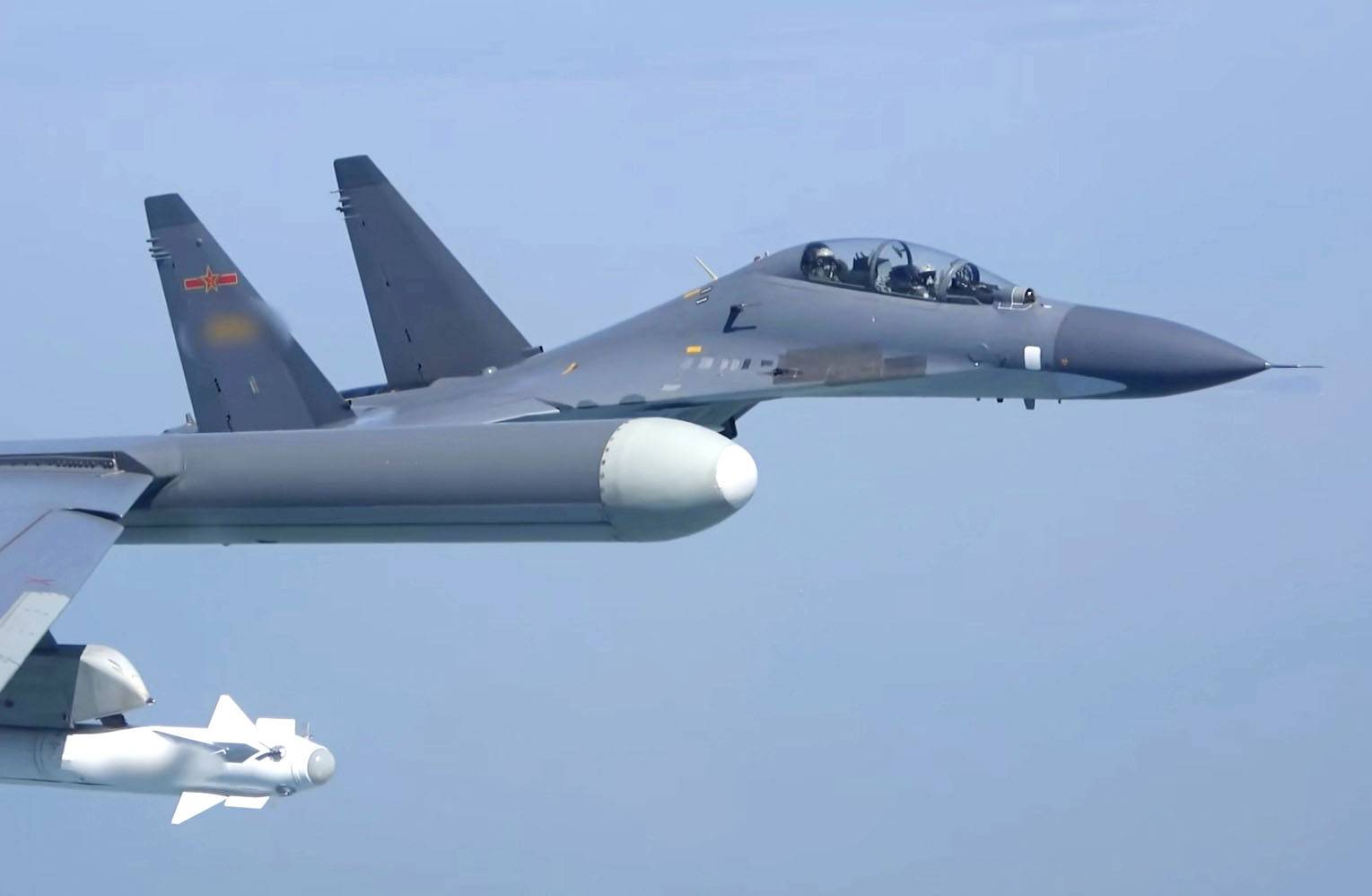 A Chinese warplane during joint military exercises around Taiwan in this image taken from video and posted to the official Weibo account of China's state-run broadcaster on Sunday | KYODO