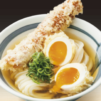Diners can choose their own toppings, from hard-boiled eggs with soft yolks to freshly cooked tempura, to garnish udon wheat noodles that they heat up themselves.