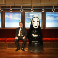 Nanzan University President Robert Kisala with 'No-Face' of 'Spirited Away' at Ghibli Park. The university is an official partner of Ghibli Park. | NANZAN UNIVERSITY