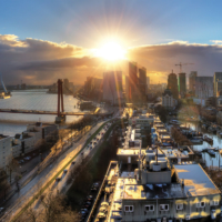 Beautiful sunset panorama of the city of Rotterdam, the Netherlands, with the river Meuse.