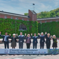 The employment ministers participating in the Group of Seven Summit pose in Kurashiki in April. | CITY OF KURASHIKI