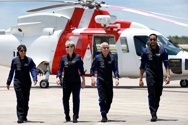 Saudi astronaut Rayyanah Barnawi, former NASA astronaut Peggy Whitson, investor pilot John Shoffner, and Saudi astronaut Ali Al Qarni arrive at the Kennedy Space Center in Florida on May 21. | BLOOMBERG