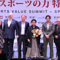 Haruhisa Handa (third from right), founder and chairperson of the International Sports Promotion Society, poses with (left to right) Dan Carter, Sophie Chandauka, Steve James, Prince Harry, Ignacio Nacho Figueras and Wim de Villiers at the ISPS Sports Value Summit — Special Edition, for charity on Aug. 9. | ISPS