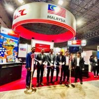 MDEC CEO Mahadhir Aziz (second from left), Embassy of Malaysia Deputy Chief of Mission Anwar Udzir (third from left) and MATRADE Tokyo Director Zuaziezie Zulkefli cut the ribbon on the Malaysia Pavilion at the Tokyo Game Show on Sept. 22 at Makuhari Messe in Chiba Prefecture. | HAFIZI YUSOFF