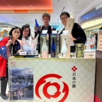 Tsunan Brewery serving GO brand sake at Haneda Airport