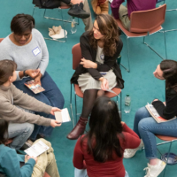 People converse at a Dialogue Nights event titled "The Courage to Dialogue: The Surest Path to Peace," at the Ikeda Center for Peace, Learning, and Dialogue in Cambridge, Massachusetts. | MARILYN HUMPHRIES