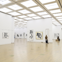 Visitors to the National Art Center, Tokyo in January peruse some of the more than 1,800 works of Japanese calligraphy selected for the 72nd Dokuritsu Sho Exhibition from across Japan. | ARK COMMUNICATIONS CO.