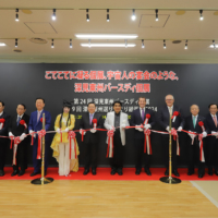 At the ribbon-cutting ceremony with Toshu Fukami standing in between Kao Kim Hourn and Peter Phillips. | TTJ TACHIBANA PUBLISHING