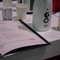 On May 22, 2024, within the TOPPAN Digital Co., Ltd. booth at VIVA TECHNOLOGY 2024, Tsunan Sake Brewery offered two types of sake: 'GO GRANDCLASS Uonuma Koshihikari Edition' and 'Green Sake'