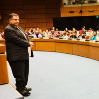 Abu-Nimer moderates a dialogue session among religious leaders at a meeting on the Plan of Action for Religious Leaders and Actors to Prevent Incitement to Violence that Could Lead to Atrocity Crimes in Vienna in 2018. | MOHAMMED ABU-NIMER