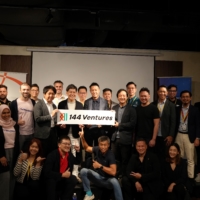 Commemorative photo of 144 Ventures' founding day. Our CEO, Suzuki, is holding the right end of the logo