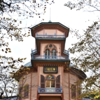 Former Saiseikan Hospital building viewed from the front.  As you walk through the park, a colorful building suddenly comes into view.