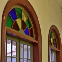 The stained glass, created from small glass pieces, vividly decorates the building.