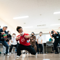 Participants rehearse for their "Breakthrough Journey" dance performance in Tokyo in 2022, building a strong sense of camaraderie. | RYOHEI TOMITA